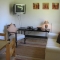 The lounge/dinette area in Swiss Cottage Self Catering Unit.